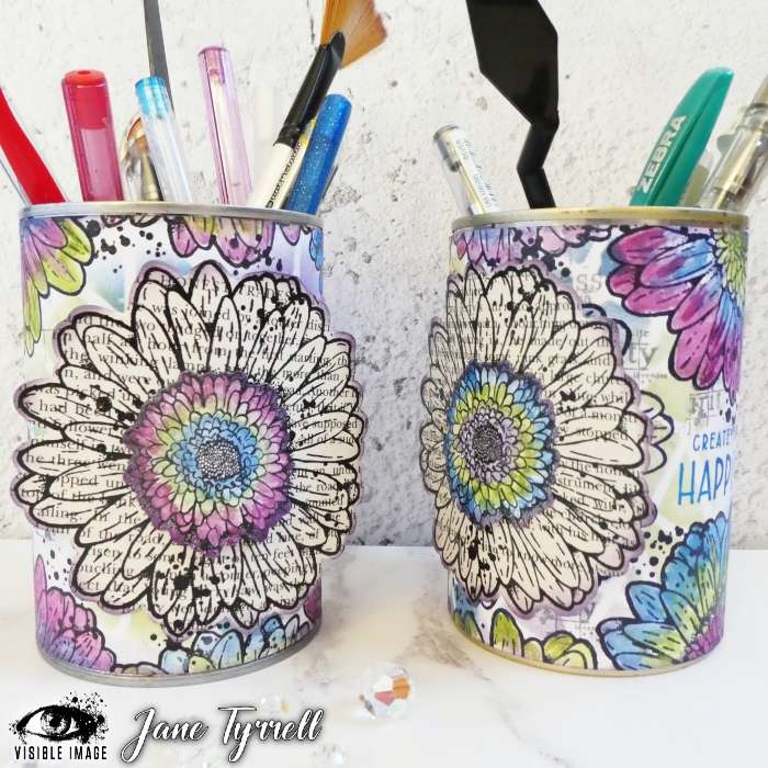 upcycled tins using flower stamps
